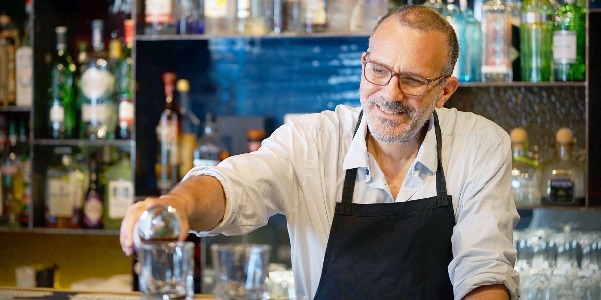 Bartender mixing drinks