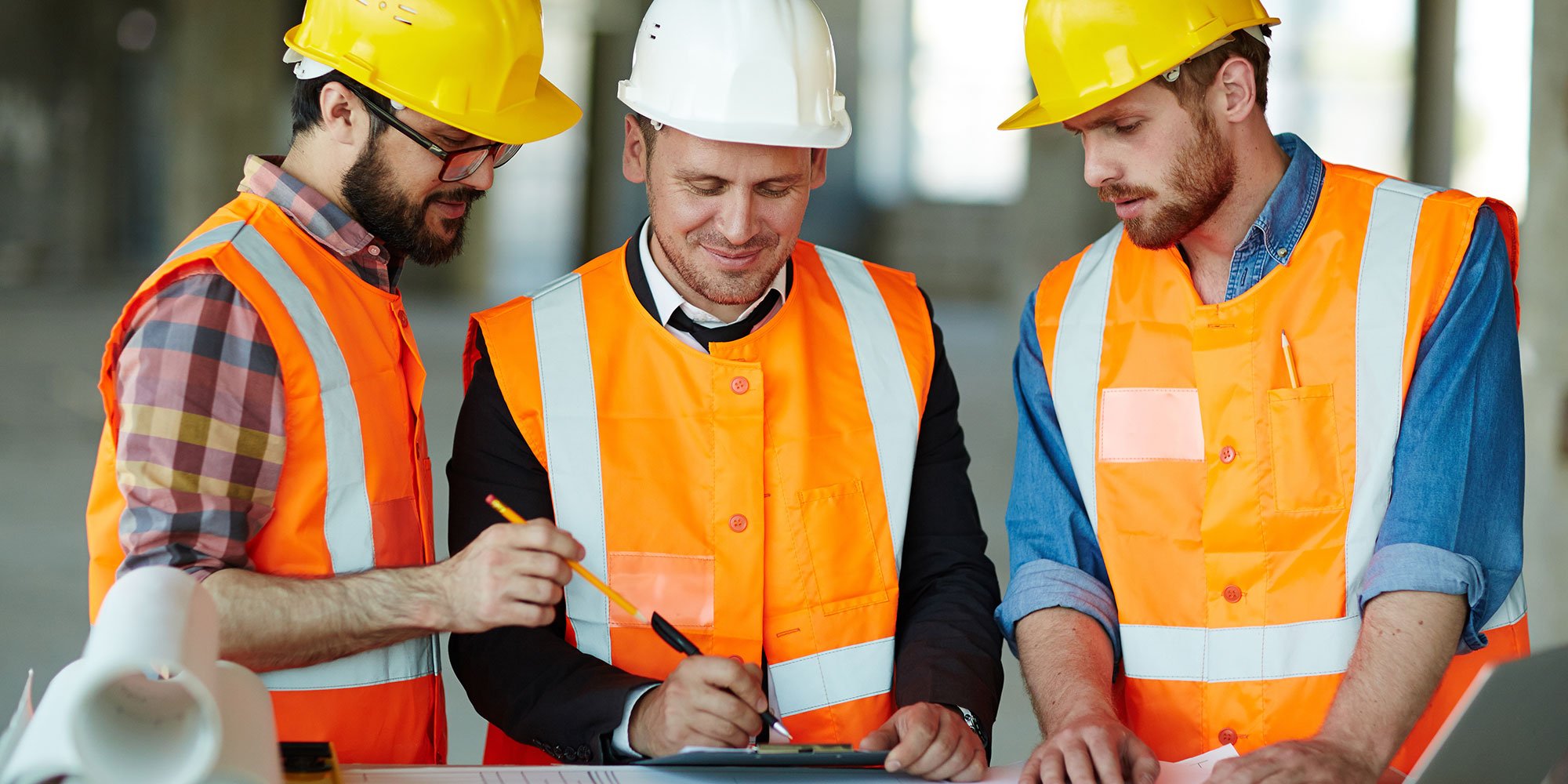 construction team going over a project plan